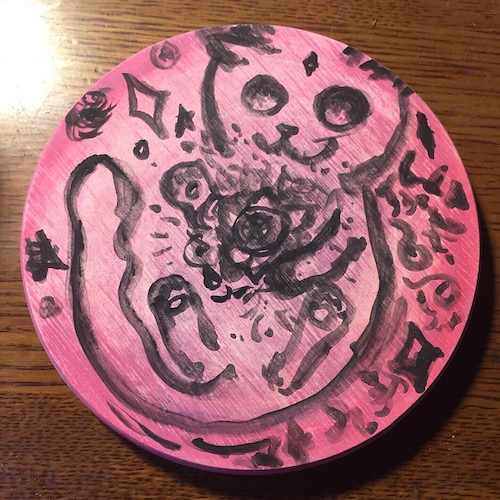 Diatomaceous earth cup coaster with water color painting of a cat playing with the universe